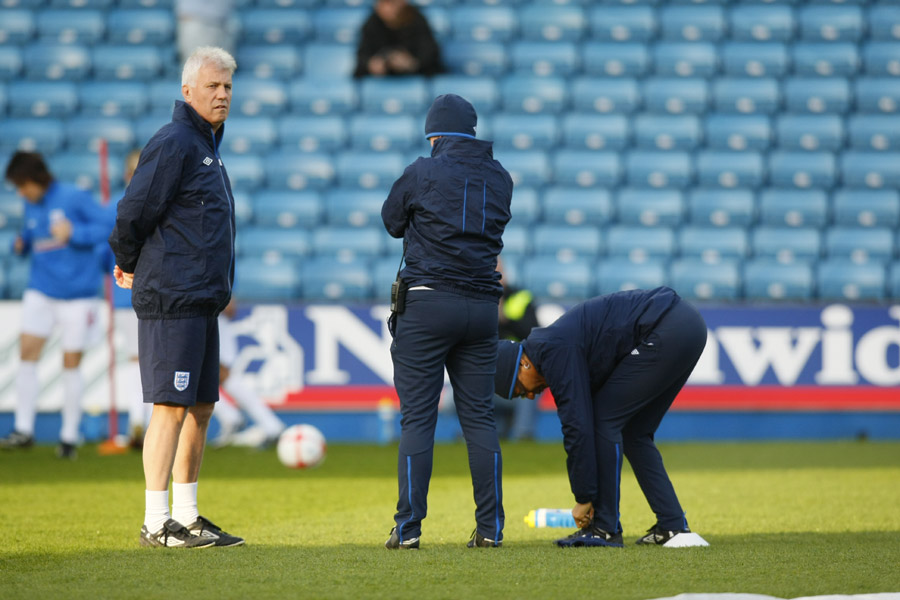 Brent Hills watches on during an England Women's team pre-match warm-up.
